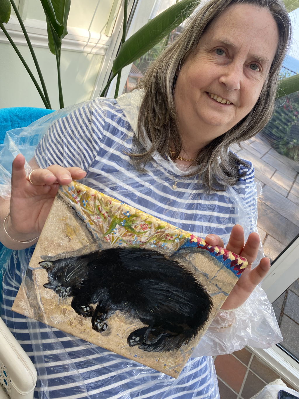Students Painting her pet cat