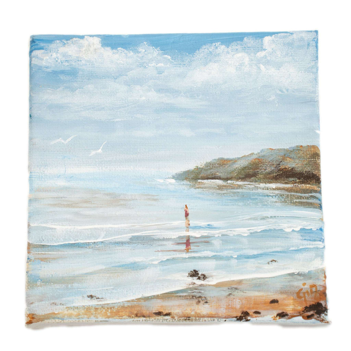 Seaside landscape wall art with ocean, shoreline, and distant cliffs in blue tones